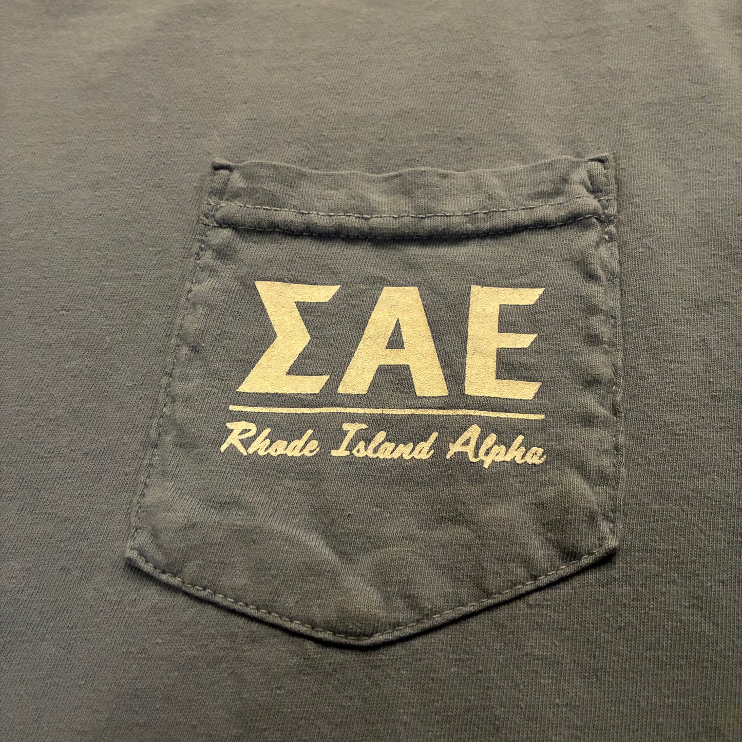 Rhode Island Greek Life Tee with Utility Pocket (L)